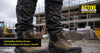Tradesperson wearing Caterpillar safety boots on a UK construction site