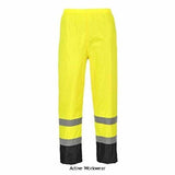 Yellow navy Portwest Hi Vis Classic Waterproof Contrast Trouser H444 Hi Vis Waterproofs Active-Workwear Lightweight and practical, these stylish Portwest Contrast trousers provide comfort and protection against adverse weather conditions. Features include waist elastication for comfort and ease of movement, stud adjustable hems for a secure fit and taped seams for full protection against wind and rain. Features CE certified Taped seams to provide additional protection Reflective tape