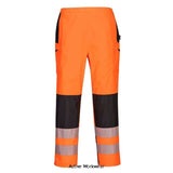 Orange PW3 Women's Hi Vis waterproof Rain Over Trouser Pants RIS 3279 Portwest PW386 Trousers Portwest Active-Workwear The PW3 Ladies H V Trouser with its genuine female fit, modern design and rugged 300D oxford weave fabric, this over trouser will keep the wearer looking great while also remaining visible, warm and dry. Clever features include multiple secure zipped pockets, reinforced knees