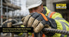 construction worker wearing protective work gloves while handling steel rebar