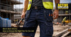 mens work shorts with cargo pockets worn on construction site
