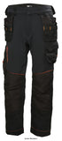 Black Helly Hansen Chelsea Evolution Stretch Construction trousers- 77441 Kneepad Trousers Active-Workwear- The Chelsea Evolution Pant gives you the best of two worlds  a durable pant that guarantees ease in movement. The 4-way stretch fabric combined with our legendary Chelsea cotton fabric delivers this promise. Modern fit, improved pocket solutions, extraordinary design