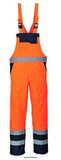 Orange Navy Hi Viz Waterproof Contrast Bib and Brace Unlined RIS 3279 Portwest S488 Hi Vis Waterproofs Active-Workwear A Portwest waterproof hi viz garment designed to be completely practical and safe, the Contrast Bib & Brace protects the lower body and chest against wet conditions whilst ensuring safety. CE certified Waterproof and breathable with taped seams to prevent water penetration Reflective tape for increased visibility 6 pockets for ample storage
