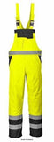 Yellow Black Hi Viz Waterproof Contrast Bib and Brace Unlined RIS 3279 Portwest S488 Hi Vis Waterproofs Active-Workwear A Portwest waterproof hi viz garment designed to be completely practical and safe, the Contrast Bib & Brace protects the lower body and chest against wet conditions whilst ensuring safety. CE certified Waterproof and breathable with taped seams to prevent water penetration Reflective tape for increased visibility 6 pockets for ample storage