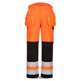 Orange PW2 Hi Vis Holster pocket Work Trouser Non Scratch non metallic Portwest-PW242 Hi Vis Trousers PortWest Active Workwear A thoughtfully designed hi-vis trouser featuring multi-functional holster pockets, top loading kneepad pockets and a side elasticated waist. Durable Kingsmill fabric and Texpel stain resistant finish ensures that the garment stays looking new for longer. Precision engineered with anti-scratch and metal-free trims to give total peace of mind when working.