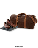 Brown Quadra Vintage Canvas Holdall Travel Bag Kit Bag - QD613 Bags Active-Workwear Detachable adjustable shoulder strap with pad Zippered front pocket Internal valuables pocket Padded base panel 2 tone webbing detail on Sahara colourway Antique brass effect fittings Padded hand grip Dimensions 58x30