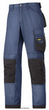 Navy Blue Snickers Rip Stop Cordura Loose Fit Work Trousers with Kneepad Pockets -3313 Trousers Active-Workwear Turn down the heat. Wear these amazing work trousers made of super-light yet durable rip-stop fabric. Count on advanced cut, superior Cordura reinforced knee protection and a range of pockets for all your on-the-job needs. Advanced cut with Twisted Leg design and Snickers Workwear Gusset in crotch for outstanding working comfort with every move