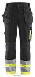 Black Yellow Blaklader Hi Vis Class 1 Knee Pad Work Trousers with Nail Pockets -1529 1860 Hi Vis Trousers Active-Workwear Hi-Vis trousers with CORDURA®-reinforcements on the knees for extra durability. These trousers have the right protection and built-in functionality. Rule pocket with an extra pocket. Certified according to EN ISO 20471, class 1 protective clothing with high visibility.