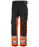 Orange Hi Viz Helly Hansen Alna 2.0 Hi Viz Work Stretch Trousers Class 1-77420 Hi Vis Trousers Active-Workwear The Helly Alna Work Pant 2.0 Class 1 has a multi-functional thigh pocket, heat transfer reflectives and stretch fabric that provides a better fit. It is a great choice for the worker who needs to stay comfortable, safe and visible at work.  2-way stretch fabric Articulated knees for optimal mobility Broad canter back belt loop for extra stability and strength Cordura fabric reinforcement 