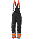 Orange Helly Hansen Alna 2.0 Winter Waterproof padded salopette/Pant Class 1-71490 Hi Vis Trousers Active-Workwear The Alna Winter Pant 2.0 Class 1 has a great fit, innovative pocket solutions and heat transfer reflectives to make sure you stay comfortable and visible while working through the cold dark days of winter. Part of the all new Helly Alna 2.0 range Air permeability Class 3