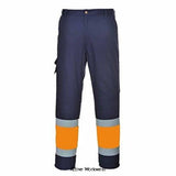 Hi-Vis 2 Tone Combat Trousers EN20471 class 1 Portwest E049 Hi Vis Trousers Active-Workwear This fully certified combat trouser in a contrast navy colourway has a multitude of clever features. The predominantly Navy colourway ensures that your trousers look great and keep clean for longer. Durable polyester/cotton fabric with Texpel stain resistant finish 50+ UPF rated fabric to block 98% of UV rays. Reflective tape for increased visibility