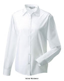 White Russell Collection Ladies Long Sleeve Shirt-934F  Made from one of the most classic shirt fabrics combining elegance with durability and wearer comfort Classic single button collar Rounded 2 button adjustable cuffs V-shaped pocket over left chest Rounded hem 
