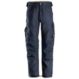 Navy Snickers Allround Work Canvas Stretch Work Trouser-6324 Trousers Snickers Active-Workwear Durable work trousers crafted for construction work with heavy-duty demands. Durable and comfortable Canvas+ fabric. Ventilation opening at back of knees. CORDURA reinforcement at knees and lower legs. KneeGuard Pro system certified according to EN 14404. Classic cargo pocket with attachment for ID badge. Tool holder, leg pocket with knife fastener, and front loops with key holder possibility.