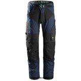 Navy Snickers FlexiWork Slim Fit Work Trousers with Kneepad Pockets - 6903 Trousers Active-Workwear Non Holster version - If holster pockets are required - please see 6902 Snickers Flexi are light work trousers in high tech body mapped design for extreme working comfort and flexibility. Combining ventilating stretch fabric with Cordura® reinforcements and a range of pockets for outstanding freedom of movement and functionality. High-tech body-mapped design 