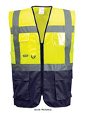 Yellow Navy Blue Warsaw Executive zipped two tone hi viz Vest Portwest C476 Hi Vis Tops Active-Workwear This Portwest two tone executive high visibility vest option in our executive vest range features several practical pockets, a dual ID holder, d-ring and a radio loop. It is available in a range of contrasting colour combinations to suit the increasing demand in the workplace.