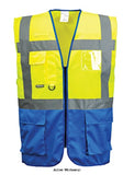Yellow/Royal Blue Warsaw Executive zipped two tone hi viz Vest Portwest C476 Hi Vis Tops Active-Workwear This Portwest two tone executive high visibility vest option in our executive vest range features several practical pockets, a dual ID holder, d-ring and a radio loop. It is available in a range of contrasting colour combinations to suit the increasing demand in the workplace.